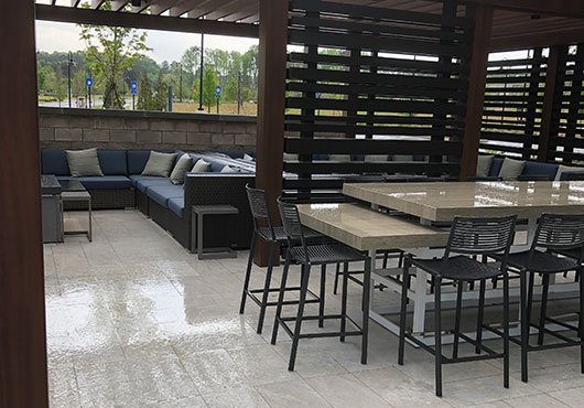 Holliday’s Construction & Locating installed flooring from the second floor to the rooftop terrace and lounge for the 249-room Hilton Alpharetta Atlanta.