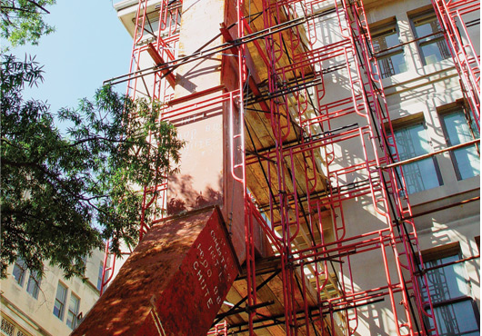 This CHUTES International heavy-duty steel chute was used on the U.S. Department of the Interior building in Washington, D.C. The chute was run through the scaffolding, with extended intake openings to protect the facade of the historic building.