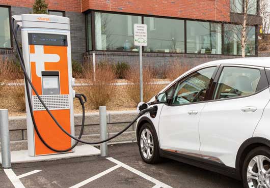 At the Bulger Veterinary Hospital in Lawrence, Massachusetts, an electric vehicle (EV) plugs into a ChargePoint station, part of the world’s largest EV charging network.