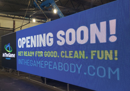 A large high-resolution digital billboard is custom-fabricated in The Sign Gallery, LLC facility for installation on Elm Street in Manchester, NH, near the SNHU Arena.