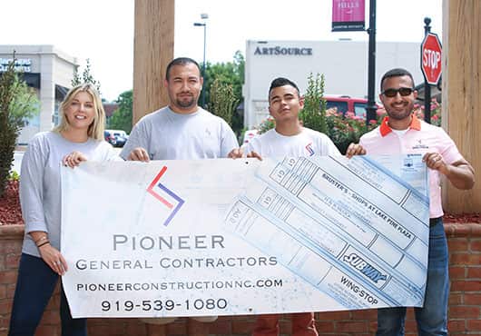 Shown from left to right are Jordan Bradley, Darwin Romero, Luis Rodriguez and Maged Tarazi at the site of a new project, Aladdin’s Eatery restaurant in Raleigh, N.C.