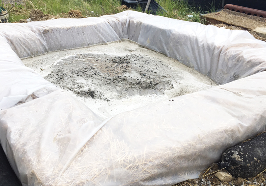 Concrete washouts, such as this newly constructed one, must be located on construction sites where trucks are delivering concrete for foundations or walls. Excess concrete must be captured by this type of structure to prevent any materials from being washed into stormwater sewer systems or nearby bodies of water.