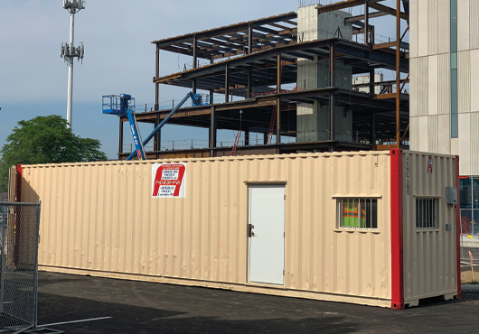 One of the American Mobile Leasing LLC containers that has been transformed into a temporary office at the construction site of Nationwide Children’s Hospital in Columbus, OH.