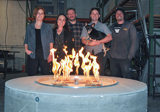 The Flame DesignZ team includes (from left) Keeley Nickelson, Apprentice/Executive Assistant; Jessi Gentile, Managing Director; Benjamin Nelson, Fabricator; Lee Corley, Director of Operations; and Andrew Martin, Fabricator.