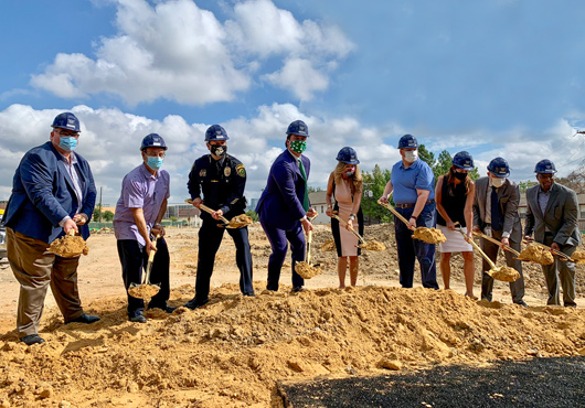 Dallas County officials, Ryan Companies US, Inc. team leaders, and local community members participated in a ceremonial dirt dig to celebrate the beginning of construction on Dallas County’s new Oak Cliff Government Center on August 26, 2020.