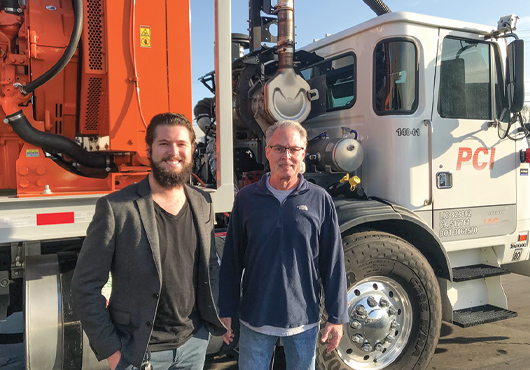 Bill Jacob (right), President of PCI, is proud of the team he’s developed over the years, which includes his son Garrett Jacob, Estimator/Project Manager.
