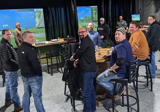 The team at Laketown Electric Corporation knows how to have a good time, even at quarterly project manager meetings!