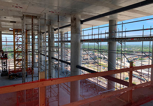 The company uses Layher scaffolding to create its custom scaffold “dance floors.”