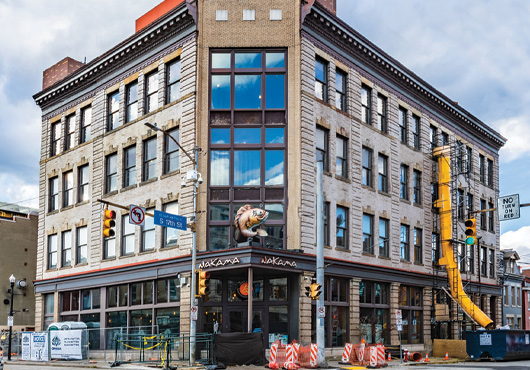 Omega Building Company completes a three-story renovation of the Nakama building in Pittsburgh, a multifamily housing development.