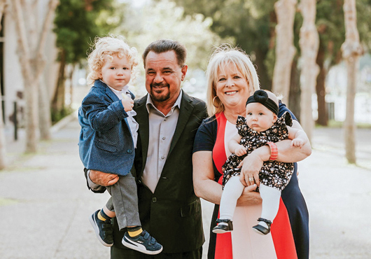 Ernie Ruffo Jr. and Patty Ruffo with their grandchildren. Family is at the heart of Ruffo Tile & Stone Inc.