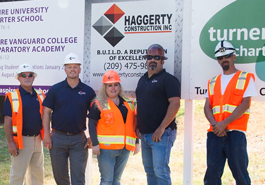 Haggerty Construction, Inc. staff attend the groundbreaking ceremony for the Aspire University Charter School and Aspire Vanguard College Preparatory Academy in Modesto, California. Pictured (left to right) are: Dennis Grooms, Superintendent; Ryan Haggerty, President; Tina Lopez, Project Engineer; John Pronoitis, a former employee; and Michael Vanhees, a multi-tradesman. 