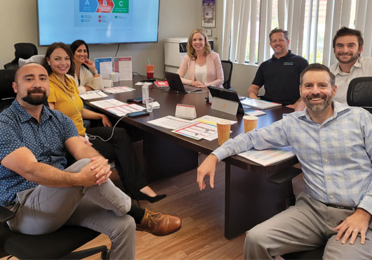 The ProCal Lighting, Inc. team (from left to right): Brian Morales, President and CEO; Denise Devine, Director of Community Business Development; Namrita Merino, Director of EV; Elise Boggs, Leadership Trainer; Stephen Lingenfelder, Director of Energy Efficiency; Brendan McCartney, Director of Specialty Lighting; and Chris Morales, Vice President of Operations.