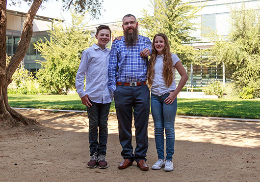 With over a decade of work in California, Colin Itzko, President and CEO of Itzko Glass & Metal, Inc., is training his children, Joseph (left) and Camryn (right),) to be the next generation of glazier.