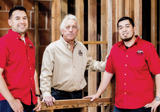 Jim Salata, President and founder of Buccaneer Demolition (center) with key members of his management team. Vice President Jose Uribe (right) and Superintendent Emmanuel Rios.