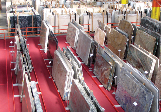 A slab-viewing area containing some of M S International, Inc.’s products, including granite, marble and quartz. Clients can walk through and choose what they want.