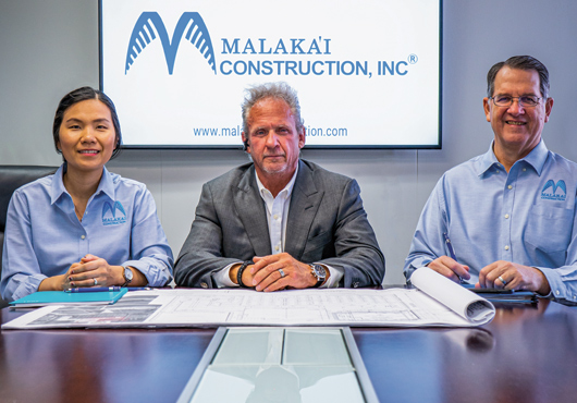 Malaka’i Construction, Inc. executives meet to review project plans for an upcoming project in Dallas, TX. Pictured (from left): Hailey Nguyen, Vice President of Operations; J Han, CEO/Chairman; and Forrest Boone, General Manager.